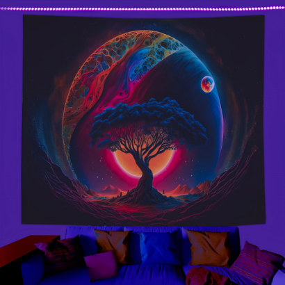 A large wall tapestry hanging above a sofa, featuring a vibrant psychedelic cosmic scene of a dark silhouette tree centered against a glowing red sun, curved colourful planets, and a starry night sky