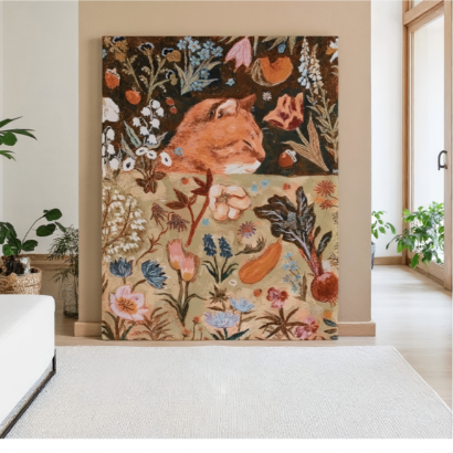 Large canvas wall art displaying an orange ginger cat peeking out from a dense, folk-art-style garden filled with colorful flowers, vegetables, and botanical illustrations in a modern room setting