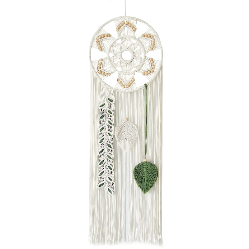 A handmade white macrame wall hanging featuring a circular woven ring accented with wooden beads, hanging fringe, and three distinct leaf-like pendants including a green leaf and a beaded strand