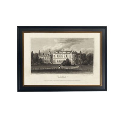 A framed black and white historical etching depicting a grand European estate mansion with grounds and a fence in the foreground, set against a white mat inside a black frame with thin gold inner lining