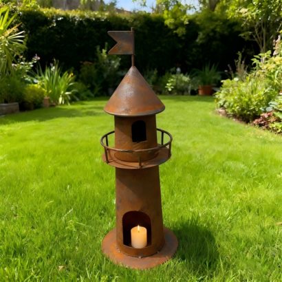 Rusted metal lighthouse candle holder, rustic coastal garden lawn ornament