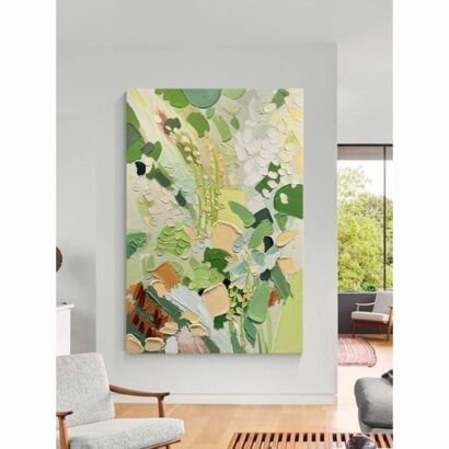 A large vertical 3D textured abstract canvas painting featuring thick impasto brushstrokes in shades of green, pale yellow, peach, and white, displayed in a modern light-filled living room.