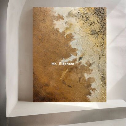 A vertical heavily textured abstract canvas painting in warm brown, terracotta, and off-white plaster tones leaning against a minimalist white wall niche.