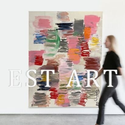 A large vertical abstract canvas painting featuring vibrant multicolor brushstrokes in pink, red, blue, green, and yellow displayed on a white wall.