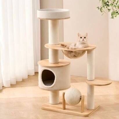 A multi-tier light-wood cat tree featuring sisal-wrapped scratching posts, a round top perch bed, a cozy cylindrical cat condo, a transparent acrylic bowl with a cat lounging inside, a spinning sisal ball at the base, and multiple wooden platforms in a bright living room.
