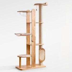A tall, light-wood multi-tier cat tree tower featuring a full-length sisal scratching post, a top perching platform with a dangling ball, a clear acrylic space capsule bowl, a fabric hammock, multiple wooden steps, and an oval scratching pad attachment on a white background.