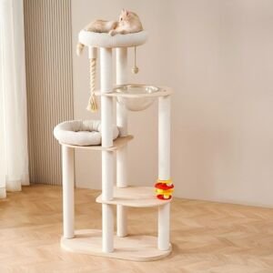 A multi-level modern cat tree featuring off-white sisal scratching posts, light wood platforms, a lower cushioned bed, a transparent acrylic space capsule bowl, a dangling rope toy, a colorful track toy, and a plush top bed where an orange and white cat is lounging.