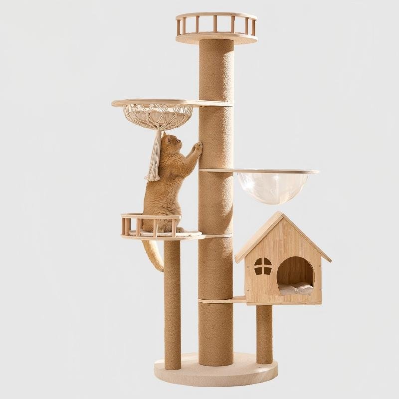 A tall, multi-tier natural wood cat tree featuring a center sisal scratching trunk, a wooden house condo near the base, a clear acrylic bowl hammock, a macrame woven tassel basket bed, and railed lookout perches, with a ginger cat reaching up to scratch the main post.