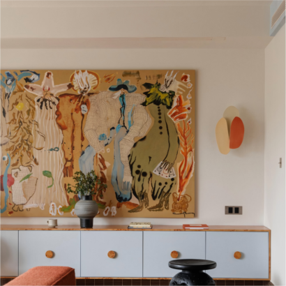 Large horizontal abstract expressionist painting featuring figurative forms in earth tones displayed above a light blue credenza side cabinet