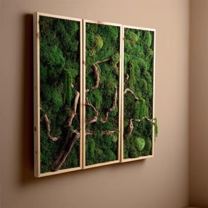 A triptych set of three vertical wooden framed wall art panels hanging on a warm beige wall, featuring lush preserved green moss and authentic gnarled wooden branches spanning across the multi-panel display.