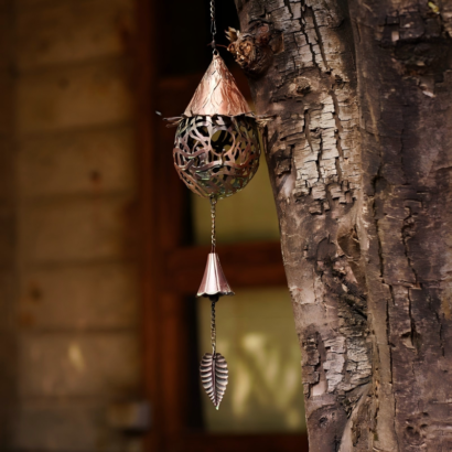Vintage Hollow Metal Wind Chime, Acorn Shape Filigree Hanging Ornament with Bell and Leaf Pendant, Hung on Tree Trunk