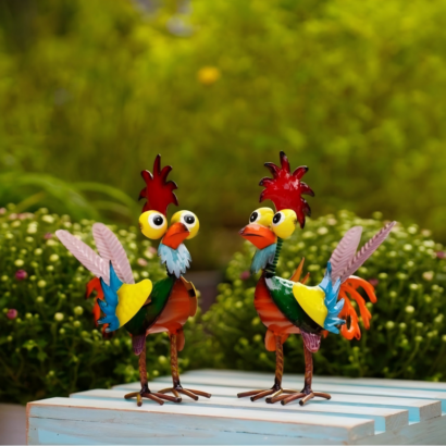 Pair of whimsical colorful metal rooster figurines, hand-painted rustic metal chicken garden statues standing on wooden platform