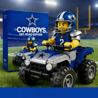 A toy building set featuring a LEGO-style Dallas Cowboys football player minifigure with a blue helmet and jersey #2 riding a blue and silver off-road ATV on a football stadium turf field next to its packaging box.