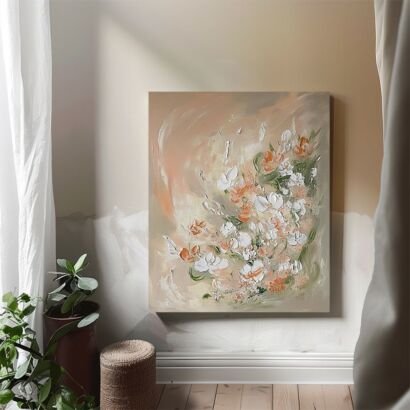 A vertical 3D textured abstract canvas painting with sculpted white and peach floral impasto brushstrokes on a warm beige and soft grey background, displayed on a wall in a cozy sunlit room.