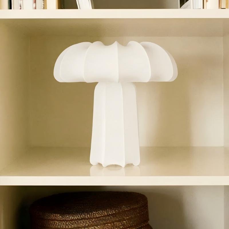 A uniquely distinctive small table lamp featuring white stretch fabric and a bulbous, garlic-like shape; suitable for living rooms, bedrooms, guesthouses, and hotels as a decorative interior lighting piece. - Image 4
