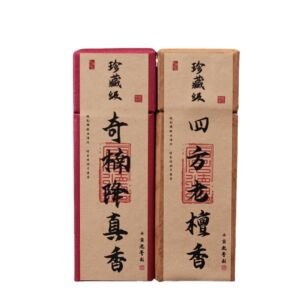 Two tall rectangular incense stick gift boxes with traditional Chinese calligraphy labels, featuring crimson red and natural kraft paper finishes.
