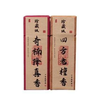 Two tall rectangular incense stick gift boxes with traditional Chinese calligraphy labels, featuring crimson red and natural kraft paper finishes.