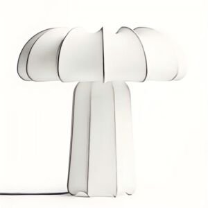 A modern sculptural table lamp featuring a mushroom-shaped white translucent fabric shade and matching base with stitched dark seam edges, isolated on a white background