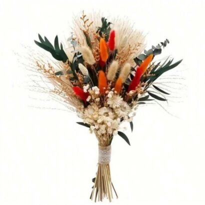 A hand-tied bohemian bouquet composed of natural dried pampas grass, white baby's breath, dark green eucalyptus stems, and plush bunny tails dyed in vibrant orange and red, wrapped with a delicate lace ribbon around the stems against a plain white background.