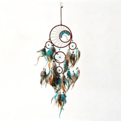 A detailed handmade brown dream catcher with a central turquoise beaded crescent moon, multiple small hoops, and cascading turquoise, natural brown, and spotted feathers.