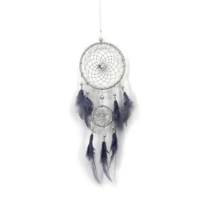 A detailed handmade dream catcher with two silver-wrapped hoops, intricate silver-beaded webs, and soft grey feathers hanging against a white background.