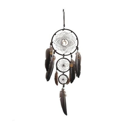 A detailed handmade black dream catcher with three vertically aligned hoops, a central crescent moon charm in the top web, and long dark feathers hanging against a plain background.